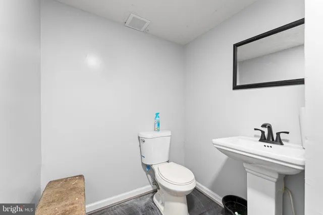 a bathroom with a sink and a toilet