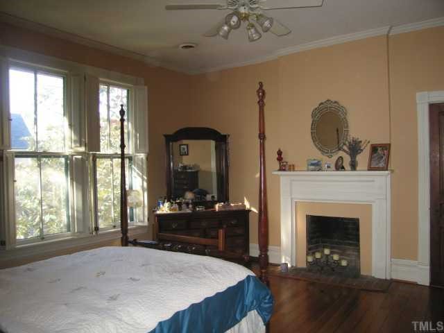 500 Polk Street Raleigh, NC 27604 - Photo 12 of 12 a living room with furniture and a fireplace