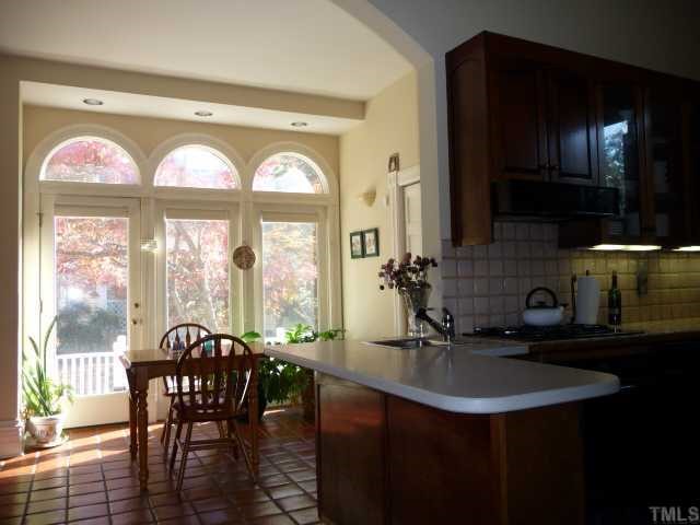 500 Polk Street Raleigh, NC 27604 - Photo 5 of 12 a view of a a dining room with furniture window and outside view