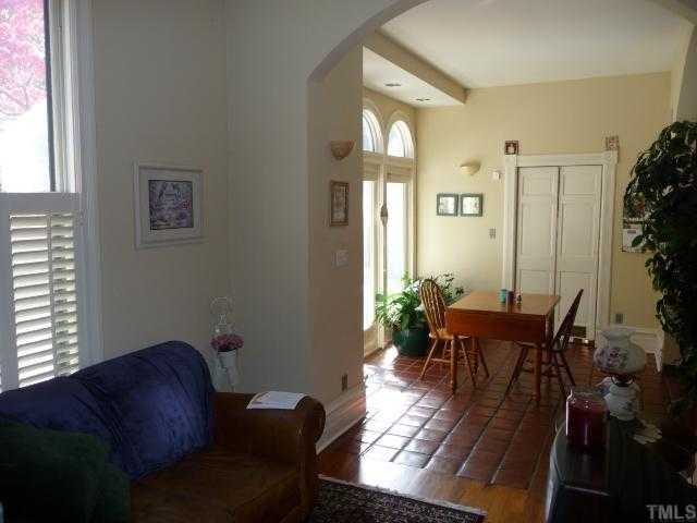 500 Polk Street Raleigh, NC 27604 - Photo 6 of 12 a view of a dining room with furniture and wooden floor