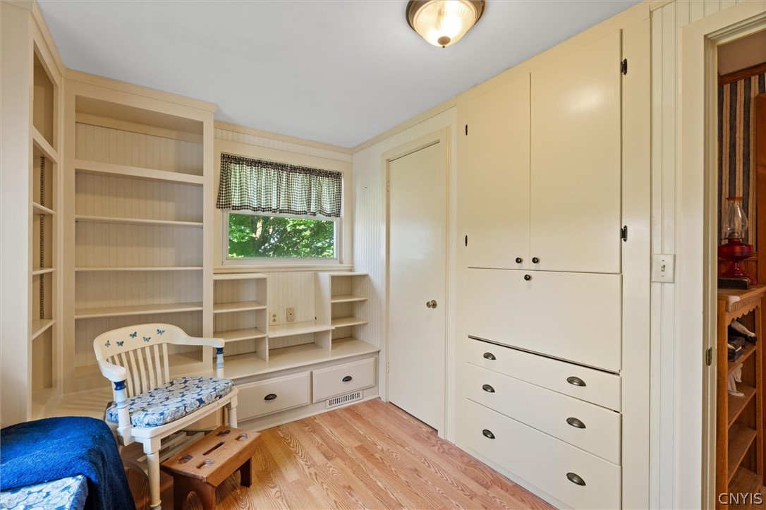 1548 West Genesee St Road Aurelius, NY 13021 - Photo 22 of 39 Custom built window seat, book shelves and stoarge