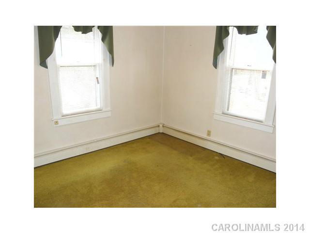 205 26th Street Southwest Hickory, NC 28602 - Photo 11 of 16 a view of an empty room with a window