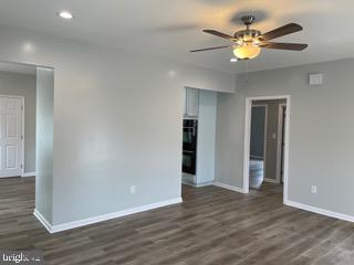 489 Myers Road Berkeley Springs, WV 25411 - Photo 11 of 26 Living room with a ceiling fan