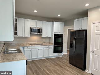 489 Myers Road Berkeley Springs, WV 25411 - Photo 12 of 26 Kitchen with SS appliances