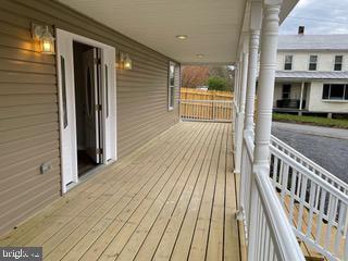 489 Myers Road Berkeley Springs, WV 25411 - Photo 5 of 26 Large front porch to entertain with family