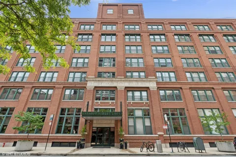 a front view of a building with windows