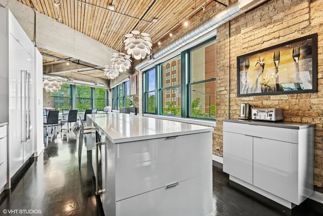 a view of balcony with wooden floor