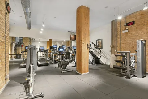 a view of a chairs and table in a patio