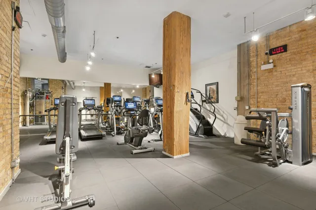 a view of a chairs and table in a patio