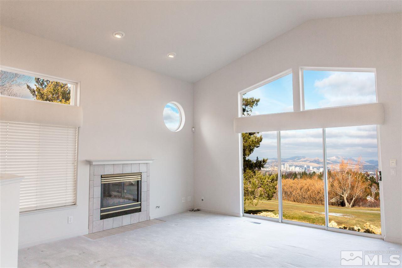 2493 Granite Springs Road Reno, NV 89519 - Photo 1 of 13 a view of an empty room with glass door