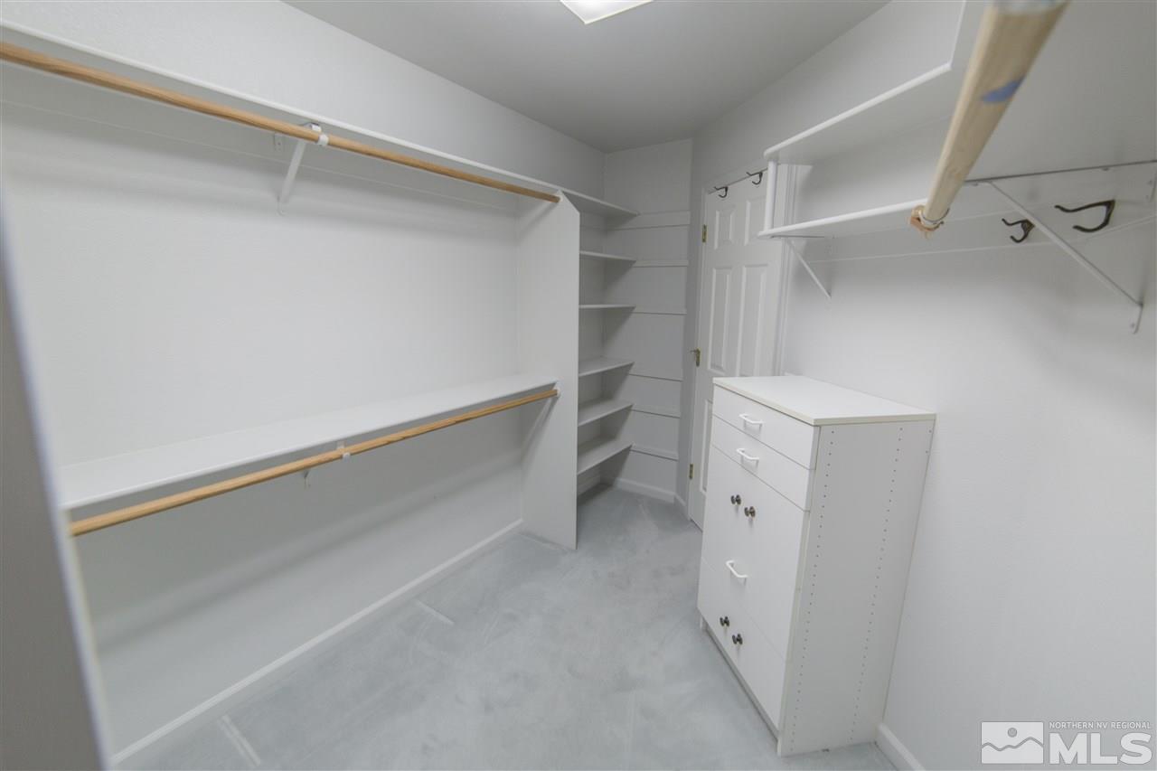 2493 Granite Springs Road Reno, NV 89519 - Photo 7 of 13 a view of walk in closet with empty racks