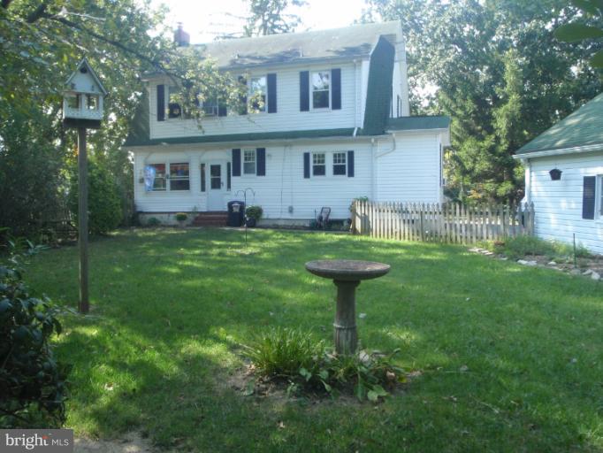 111 South Rolling Road Catonsville, MD 21228 - Photo 2 of 25 a view of a house with a backyard