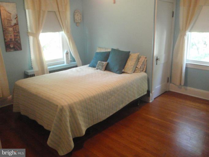 111 South Rolling Road Catonsville, MD 21228 - Photo 12 of 25 a bedroom with a bed and a window