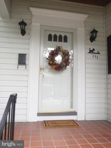 111 South Rolling Road Catonsville, MD 21228 - Photo 13 of 25 a view of entryway with a rug