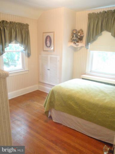 111 South Rolling Road Catonsville, MD 21228 - Photo 16 of 25 a bedroom with a bed and a window