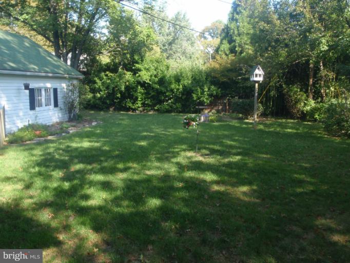 111 South Rolling Road Catonsville, MD 21228 - Photo 19 of 25 a view of a house with a backyard