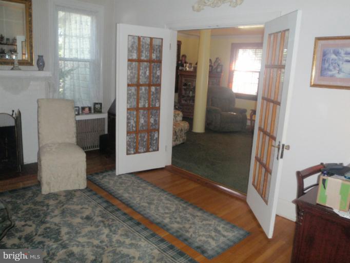 111 South Rolling Road Catonsville, MD 21228 - Photo 3 of 25 a view of livingroom with furniture and windows