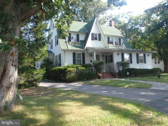 111 South Rolling Road Catonsville, MD 21228 - Photo 25 of 25 a view of a house with a yard and potted plants