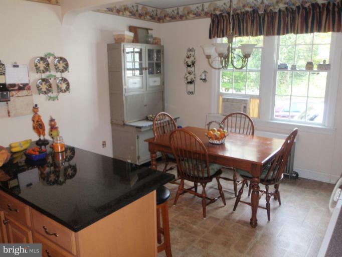 111 South Rolling Road Catonsville, MD 21228 - Photo 8 of 25 a view of a dining room with furniture and window