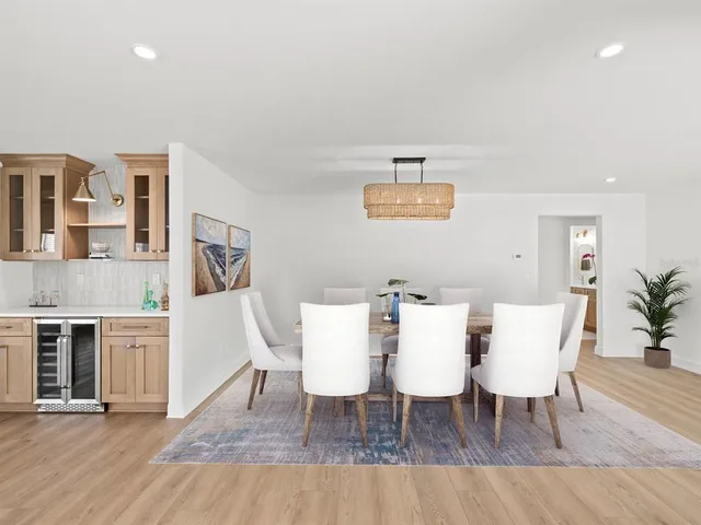 a bedroom with a large bed and a couch