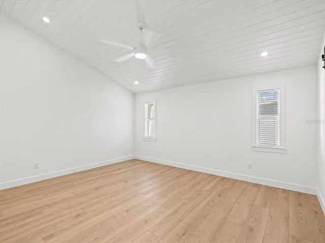 a bathroom with a double vanity sink and mirror