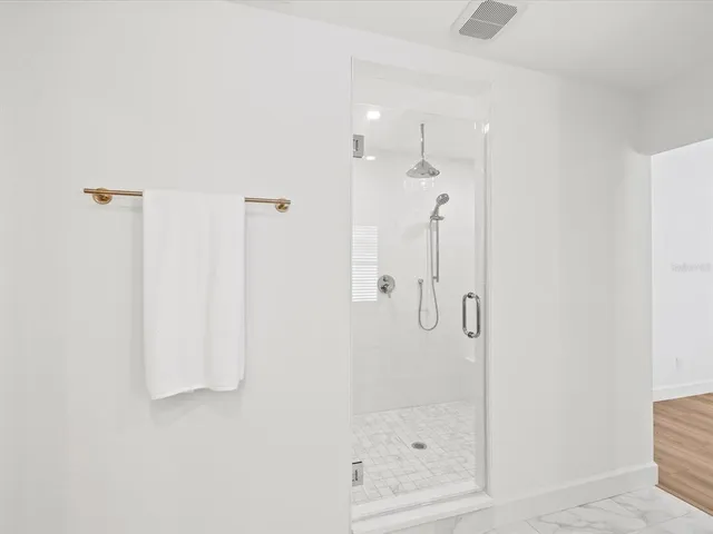 a view of an empty walk in closet