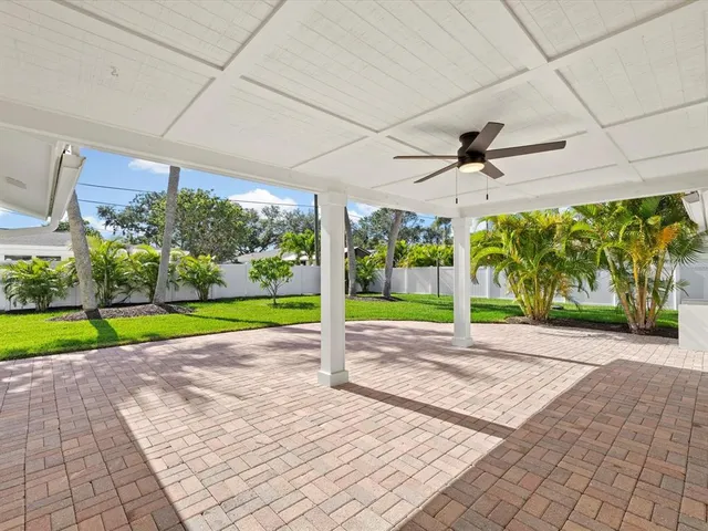 a front view of house with yard and outdoor seating