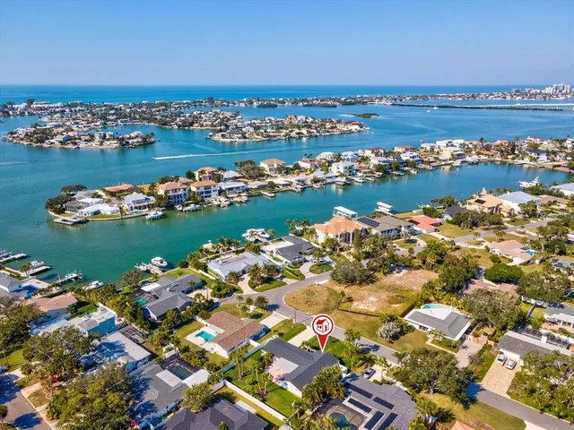 a swimming pool view with a seating space and a view of a swimming pool