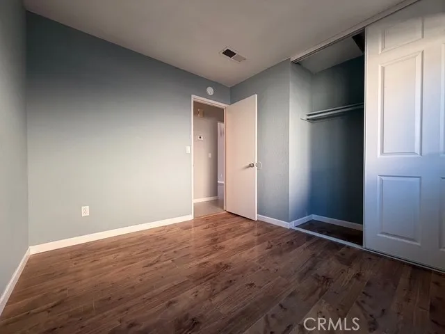 a bathroom with a double vanity sink toilet and shower