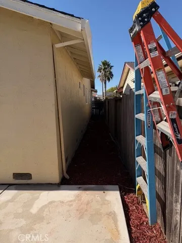 a view of a backyard of the house