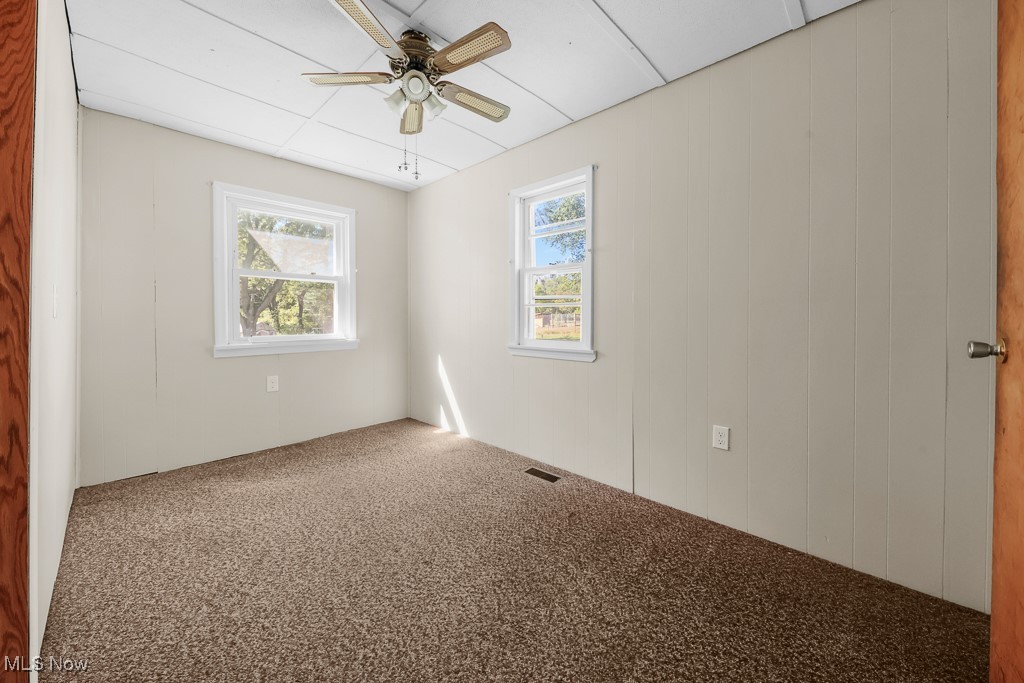 1702 Far View Road Akron, OH 44312 - Photo 15 of 49 Carpeted dining room featuring ceiling fan