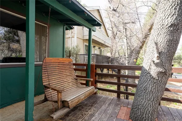 a view of a chairs setting on the deck