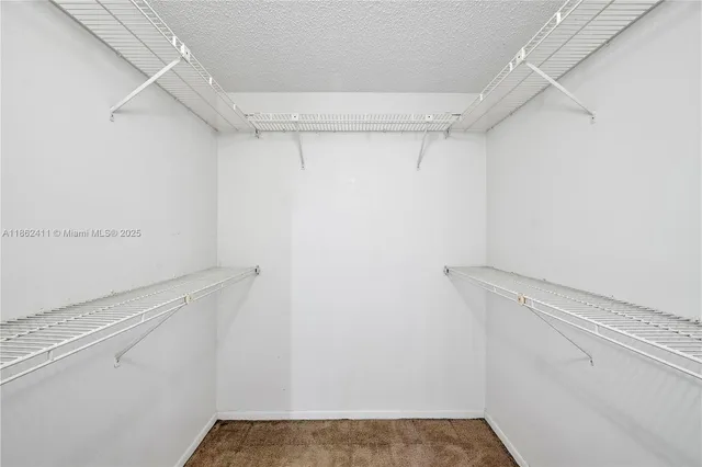 a view of a room with racks on the wall