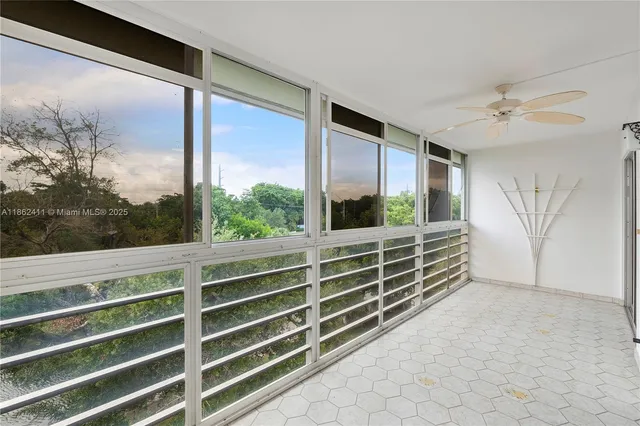 a view of a balcony with window