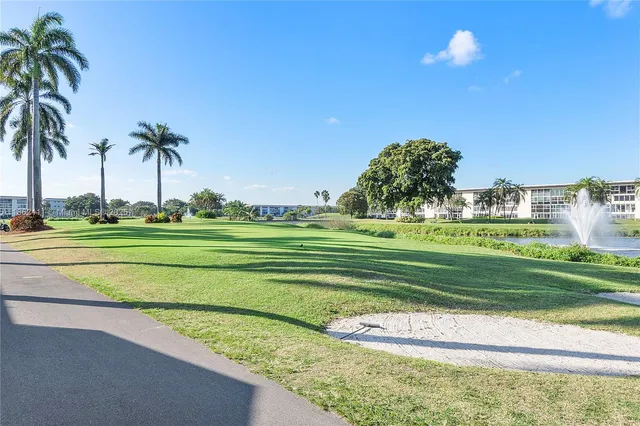 a view of a golf course with a park