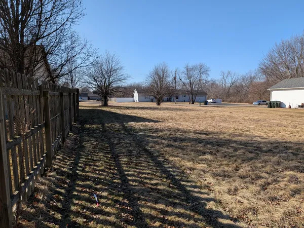 a big yard with trees