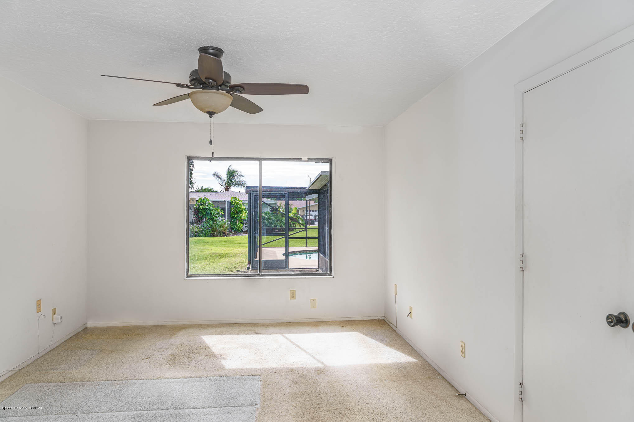 1378 Cromey Road Northeast Palm Bay, FL 32905 - Photo 14 of 25 Master Bedroom