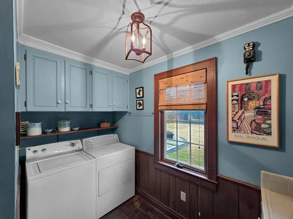 a view of cabinets and window