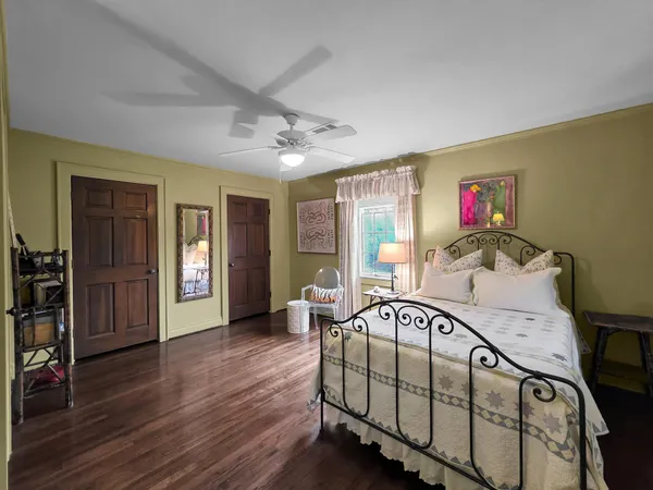 a view of a livingroom with furniture and hardwood floor