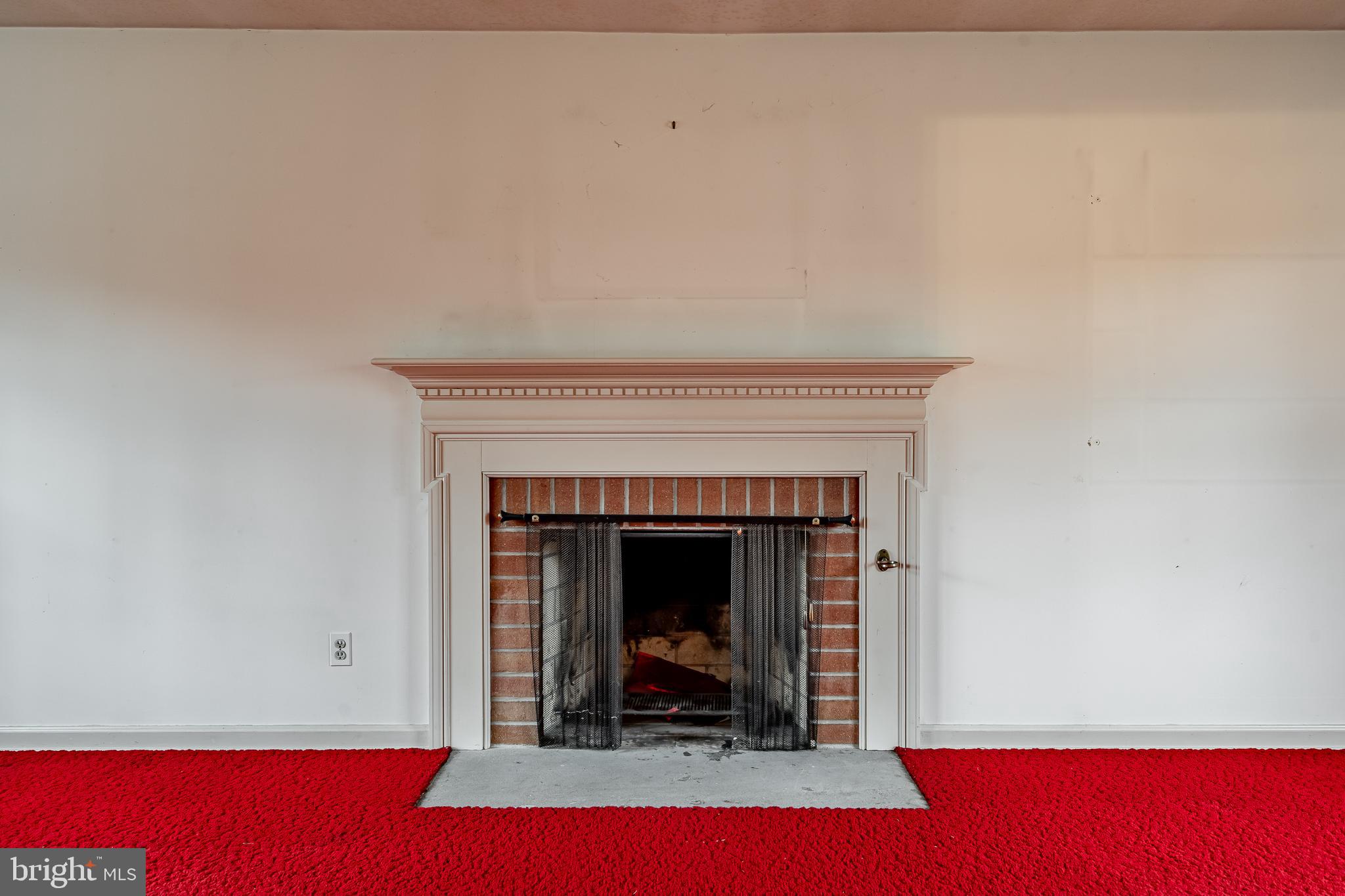 3316 Morningside Road Wilmington, DE 19810 - Photo 10 of 43 formal living room with wood burning fireplace