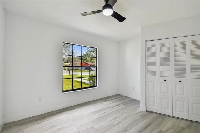 a kitchen with stainless steel appliances a refrigerator stove and microwave
