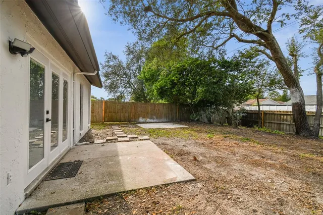 a kitchen with a sink stove and microwave