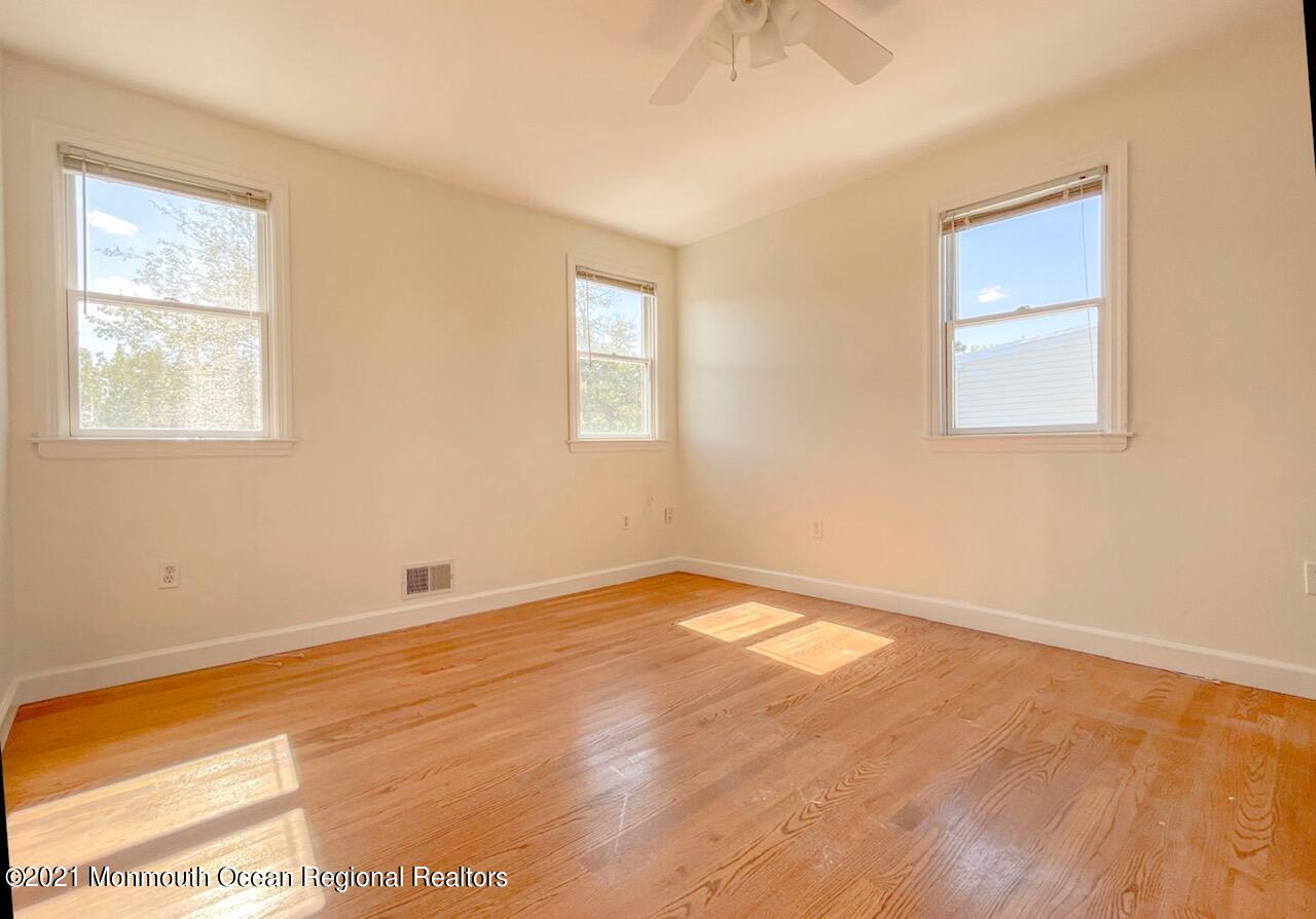 330 Front Street Union Beach, NJ 07735 - Photo 13 of 23 a view of an empty room with a window