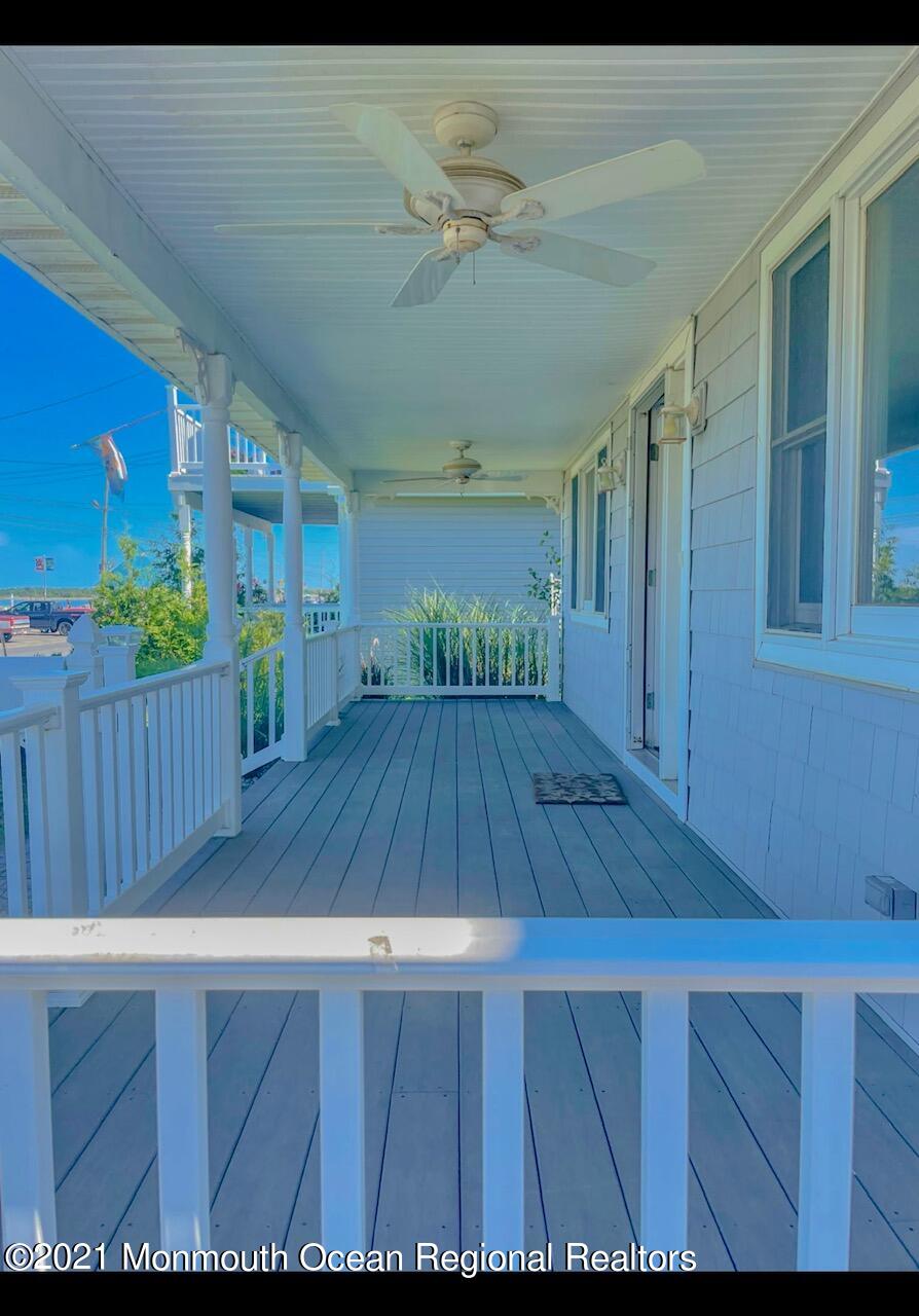 330 Front Street Union Beach, NJ 07735 - Photo 3 of 23 a view of outdoor space with a wooden deck