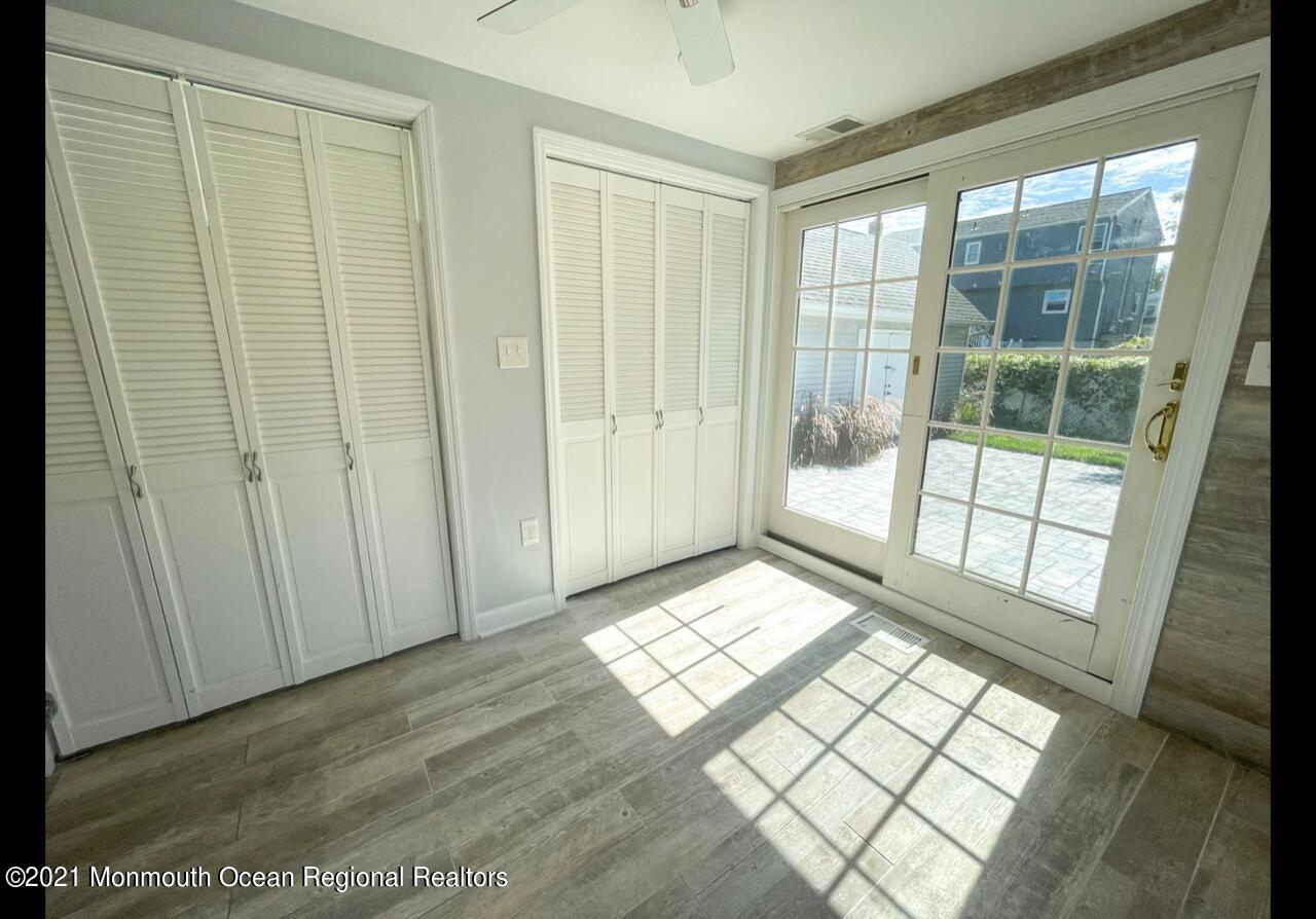 330 Front Street Union Beach, NJ 07735 - Photo 21 of 23 a view of an empty room with a window