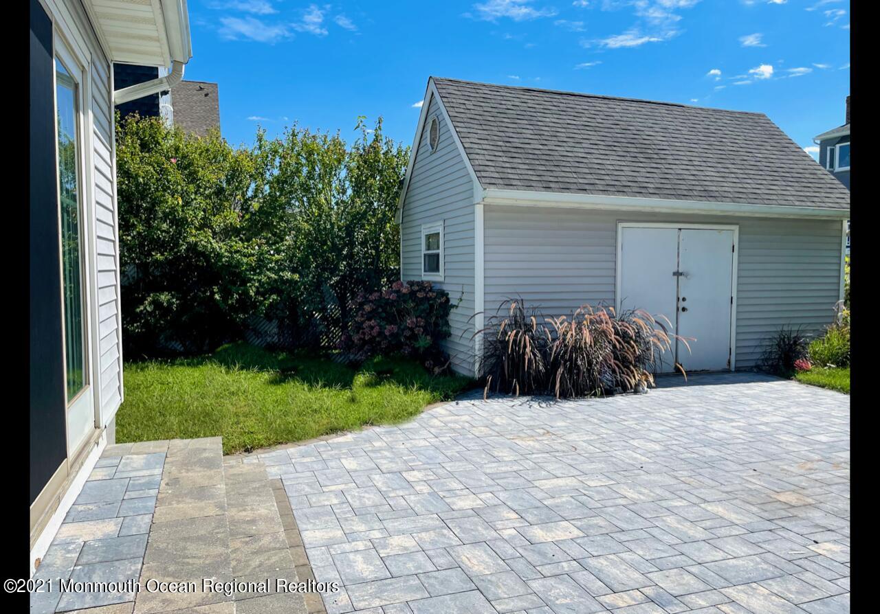 330 Front Street Union Beach, NJ 07735 - Photo 22 of 23 a view of a backyard of the house