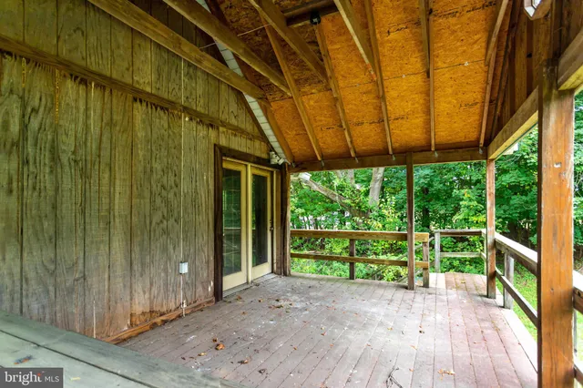 a view of a room with a large window