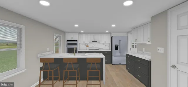 a large kitchen with a table and chairs