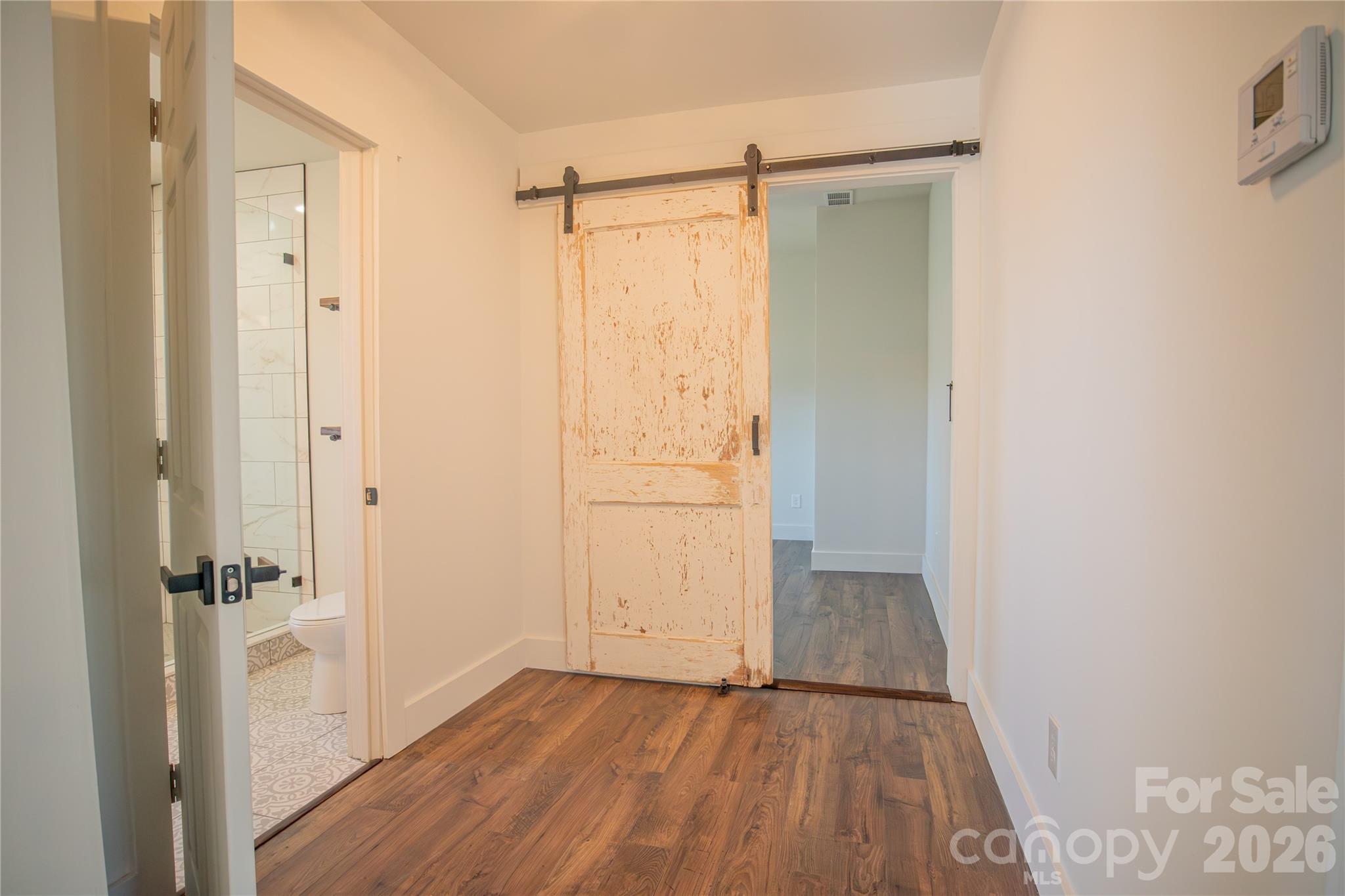 929 South Long Street Salisbury, NC 28144 - Photo 22 of 30 a view of a bathroom with wooden floor