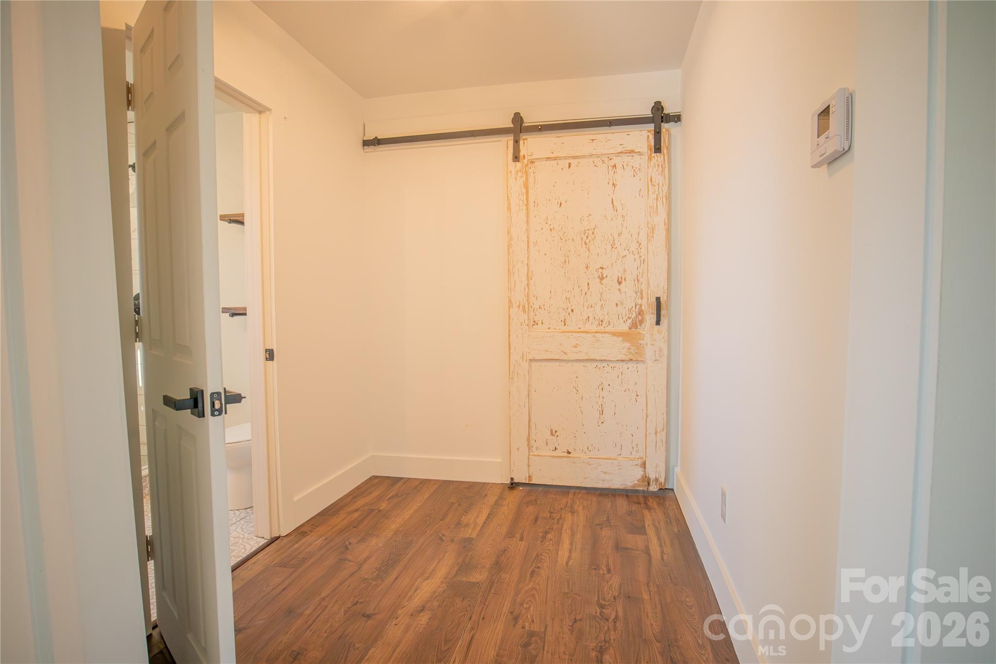 929 South Long Street Salisbury, NC 28144 - Photo 23 of 30 a view of a bathroom with wooden floor